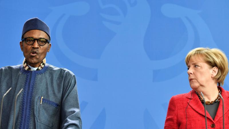 At a news conference with German Chancellor Angela Merkel, Nigeria's President Muhammadu Buhari answered criticisms from his wife. At a news conference with German Chancellor Angela Merkel, Nigeria's President Muhammadu Buhari answered criticisms from his wife.