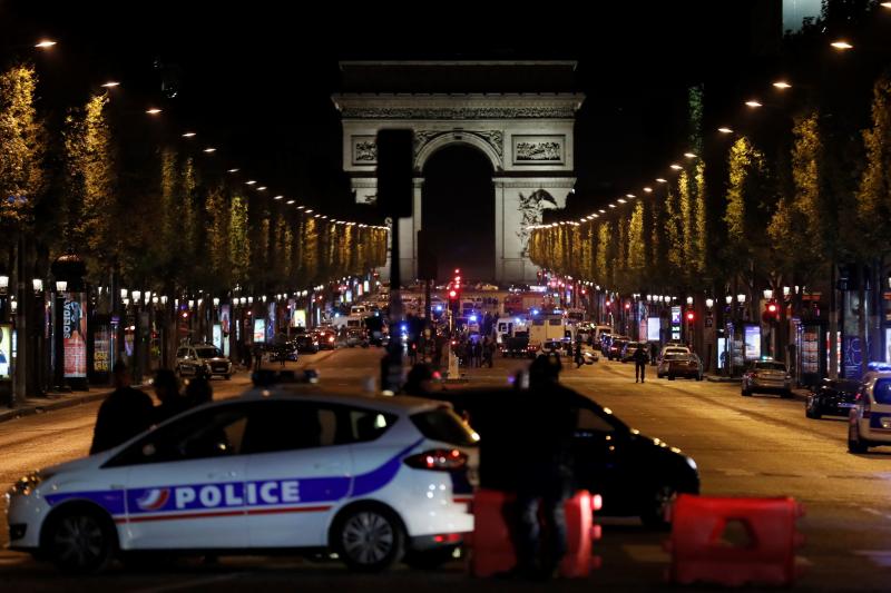 Police officers block access to the Champs Elysees in Paris after a shooting on Thursday. France's Interior Ministry said the attacker was killed in the incident on the world-famous boulevard. Police officers block access to the Champs Elysees in Paris after a shooting on Thursday. France's Interior Ministry said the attacker was killed in the incident on the world-famous boulevard.