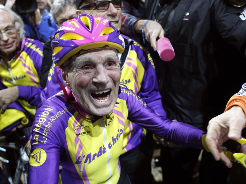 French cyclist Robert Marchand, 105, reacts after setting a record for distance cycled in one hour, at the velodrome of Saint-Quentin en Yvelines, outside Paris on Wednesday. French cyclist Robert Marchand, 105, reacts after setting a record for distance cycled in one hour, at the velodrome of Saint-Quentin en Yvelines, outside Paris on Wednesday.