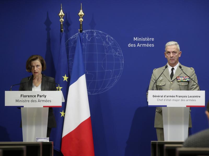 French Defense Minister Florence Parly (left) and French Army Chief of Staff Gen. François Lecointre said Tuesday that two helicopters collided in midair and killed 13 French soldiers fighting Islamic extremists in Mali. French Defense Minister Florence Parly (left) and French Army Chief of Staff Gen. François Lecointre said Tuesday that two helicopters collided in midair and killed 13 French soldiers fighting Islamic extremists in Mali.