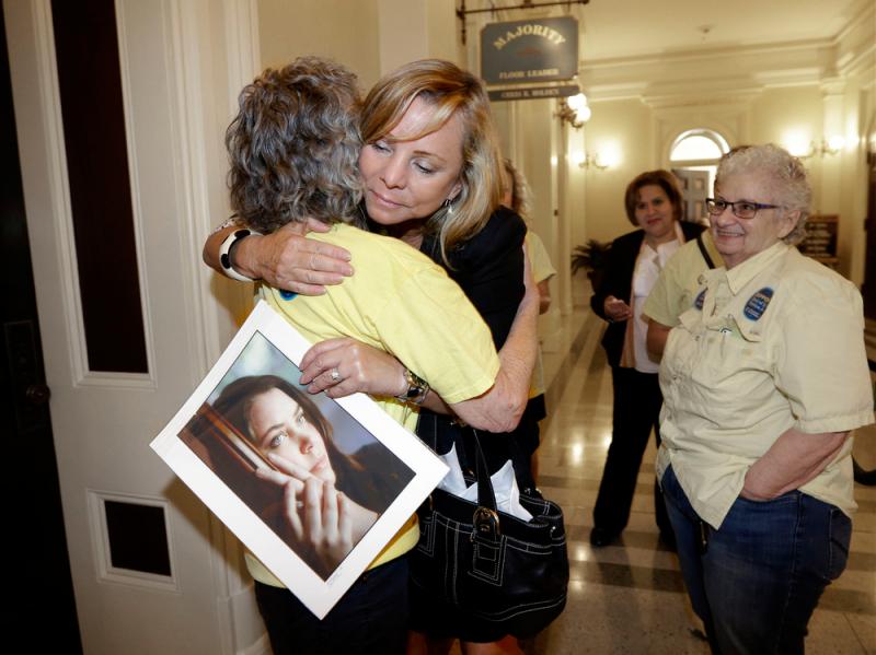 Debbie Ziegler holds a photo of her late daughter, Brittany Maynard, after the California State Assembly approved a right-to-die measure on Sept. 9. Maynard died on Nov. 1, 2014. Debbie Ziegler holds a photo of her late daughter, Brittany Maynard, after the California State Assembly approved a right-to-die measure on Sept. 9. Maynard died on Nov. 1, 2014.