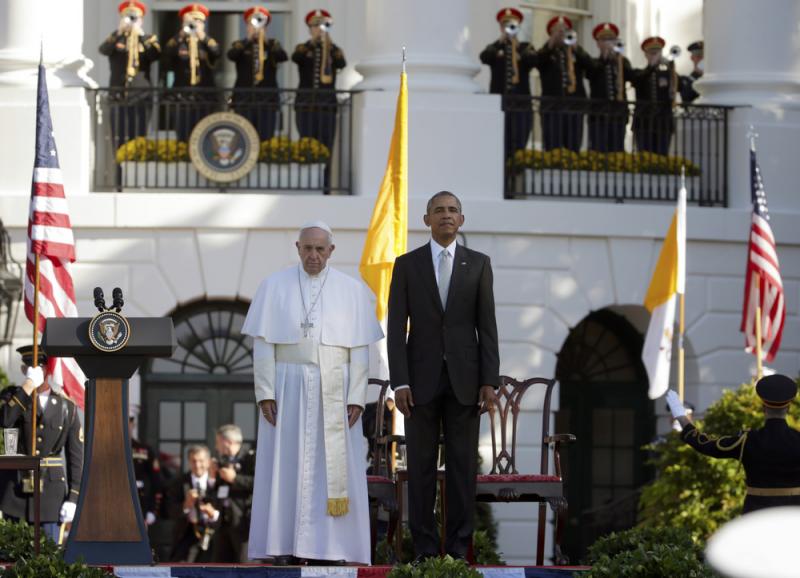 President Barack Obama and Pope Francis stand at attention during the playing of the national anthems during a state arrival ceremony for the pope on the South Lawn of the White House Wednesday. President Barack Obama and Pope Francis stand at attention during the playing of the national anthems during a state arrival ceremony for the pope on the South Lawn of the White House Wednesday.