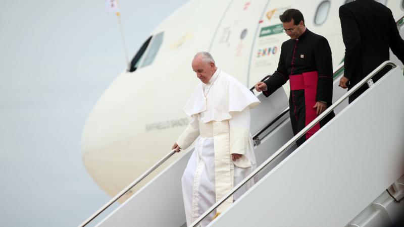 Pope Francis walks down the steps of his plane upon his arrival at Andrews Air Force Base, Md., on Tuesday. Pope Francis walks down the steps of his plane upon his arrival at Andrews Air Force Base, Md., on Tuesday.