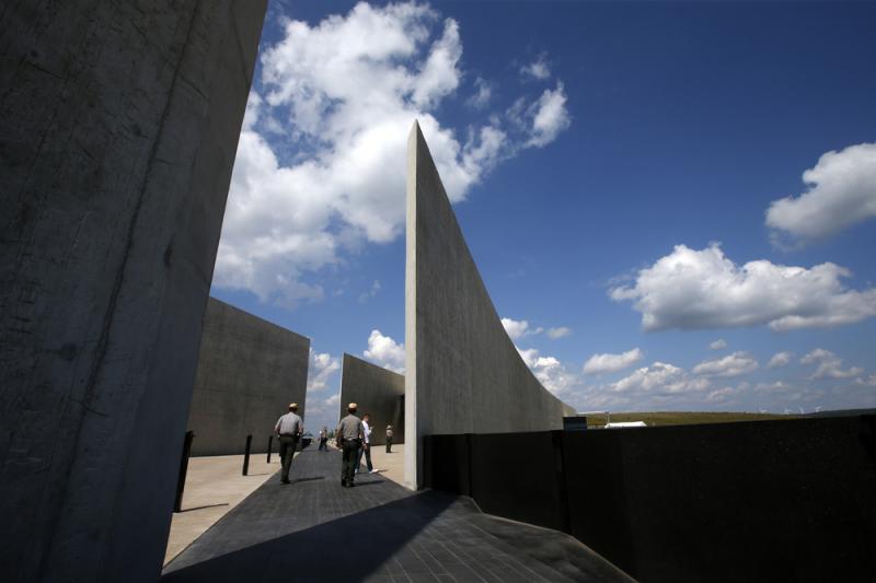 The dark stone path that bisects the Flight 93 National Memorial visitors center in Shanksville, Pa., memorializes the flight path of the United Airlines plane. The dark stone path that bisects the Flight 93 National Memorial visitors center in Shanksville, Pa., memorializes the flight path of the United Airlines plane.