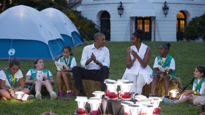 President Obama and Michelle Obama went a little Troop Beverly Hills at a Girl Scout campout on the South Lawn earlier this summer. We doubt survivalist Bear Grylls is going allow the president to bring those lanterns on their trek. President Obama and Michelle Obama went a little Troop Beverly Hills at a Girl Scout campout on the South Lawn earlier this summer. We doubt survivalist Bear Grylls is going allow the president to bring those lanterns on their trek.