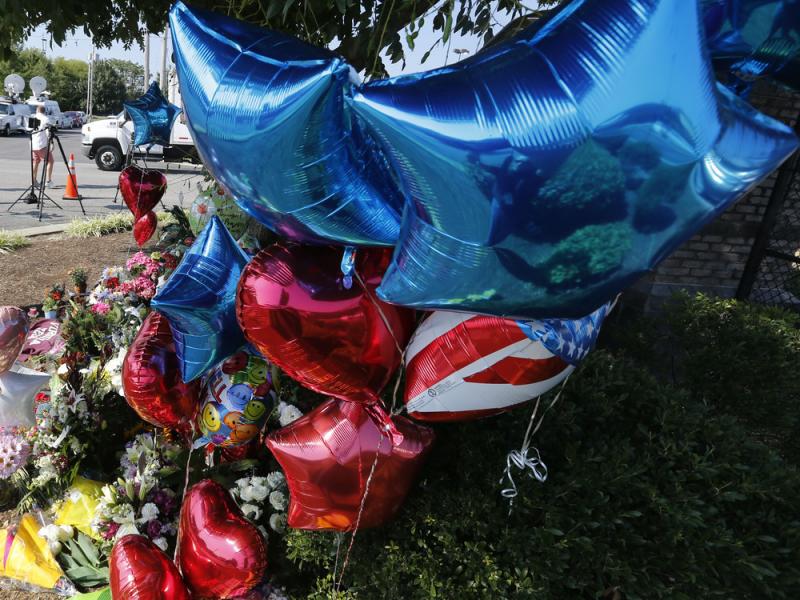 On Thursday, balloons and flowers were in front of the Roanoke, Va., studios of WDBJ-TV. A day before, WDBJ reporter Alison Parker and WDBJ photojournalist Adam Ward were killed during a live broadcast. On Thursday, balloons and flowers were in front of the Roanoke, Va., studios of WDBJ-TV. A day before, WDBJ reporter Alison Parker and WDBJ photojournalist Adam Ward were killed during a live broadcast.