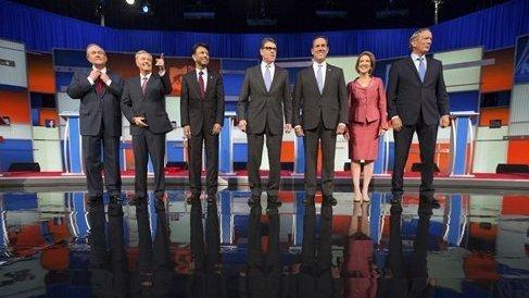 Republican presidential candidates from left, Jim Gilmore, Lindsey Graham, Bobby Jindal, Rick Perry, Rick Santorum, Carly Fiorina, and George Pataki take the stage for a pre-debate forum at the Quicken Loans Arena, Thursday, Aug. 6, 2015, in Cleveland. Se Republican presidential candidates from left, Jim Gilmore, Lindsey Graham, Bobby Jindal, Rick Perry, Rick Santorum, Carly Fiorina, and George Pataki take the stage for a pre-debate forum at the Quicken Loans Arena, Thursday, Aug. 6, 2015, in Cleveland. Se