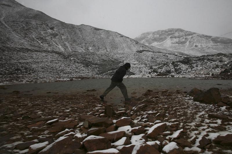 A man walks on Glacier Chacaltaya in the Andes mountains in Bolivia on Oct. 24, 2009. Glacier Chacaltaya was famous for being the world's highest ski run but since the mid-'90s has not had enough snow for skiing. A man walks on Glacier Chacaltaya in the Andes mountains in Bolivia on Oct. 24, 2009. Glacier Chacaltaya was famous for being the world's highest ski run but since the mid-'90s has not had enough snow for skiing.