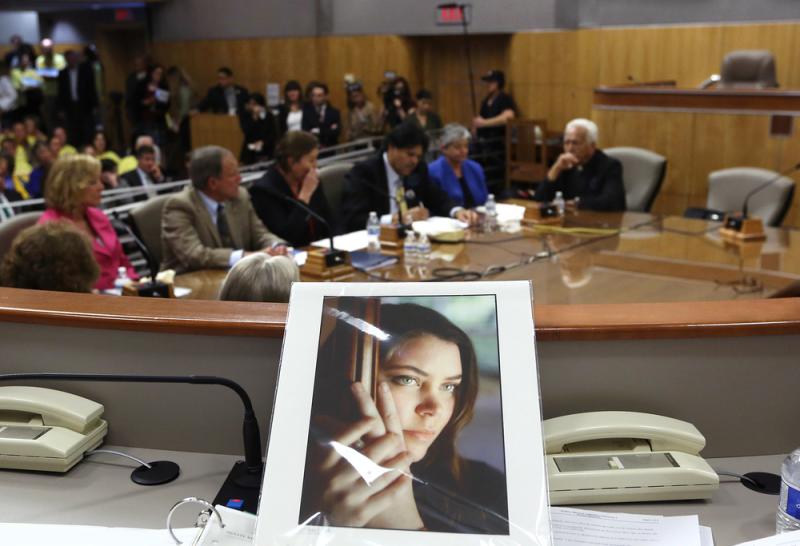 A photo of Brittany Maynard, who moved to Oregon to end her life as she was dying of brain cancer, sits on the dais of the California Senate's health committee in March. A photo of Brittany Maynard, who moved to Oregon to end her life as she was dying of brain cancer, sits on the dais of the California Senate's health committee in March.