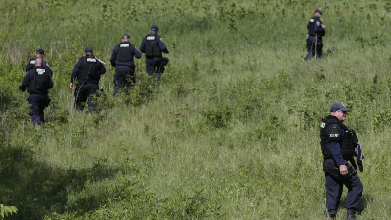 Officers search for convicted murderer David Sweat on Friday in upstate New York, after his accomplice, Richard Matt, was fatally shot by authorities. Officers search for convicted murderer David Sweat on Friday in upstate New York, after his accomplice, Richard Matt, was fatally shot by authorities.