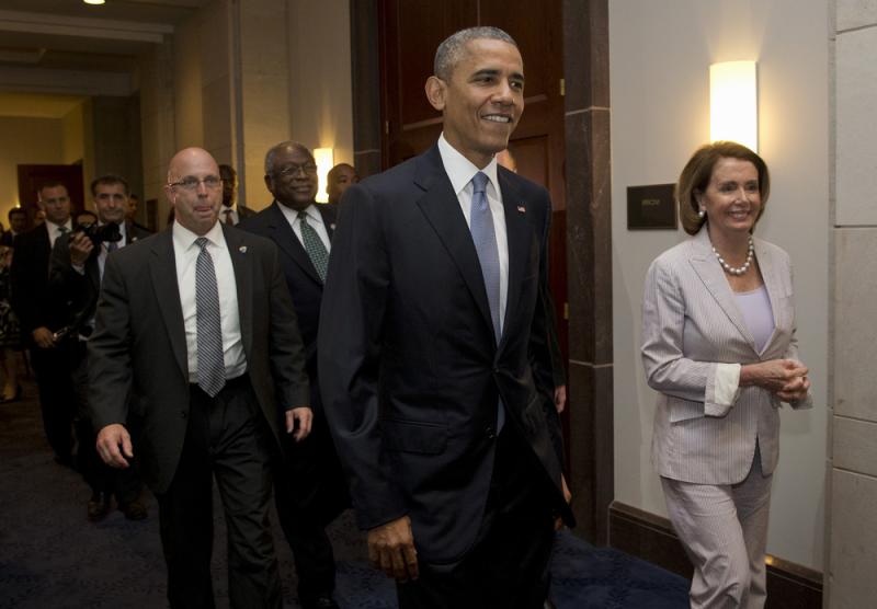 President Obama walks with House Minority Leader Nancy Pelosi as he visits Capitol Hill on Friday. President Obama walks with House Minority Leader Nancy Pelosi as he visits Capitol Hill on Friday.