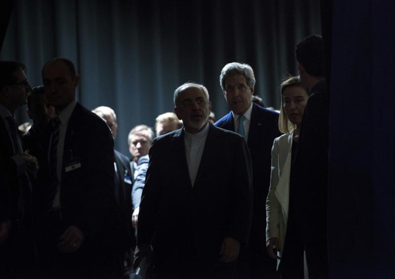 Iranian Foreign Minister Javad Zarif (center) with U.S. Secretary of State John Kerry in Lausanne, Switzerland, after talks over Iran's nuclear program wrapped up in April. Iranian Foreign Minister Javad Zarif (center) with U.S. Secretary of State John Kerry in Lausanne, Switzerland, after talks over Iran's nuclear program wrapped up in April.