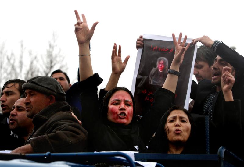 Afghan women demand justice for a woman who was beaten to death by a mob after being falsely accused of burning a Quran, at a demonstration in March. Afghan women demand justice for a woman who was beaten to death by a mob after being falsely accused of burning a Quran, at a demonstration in March.