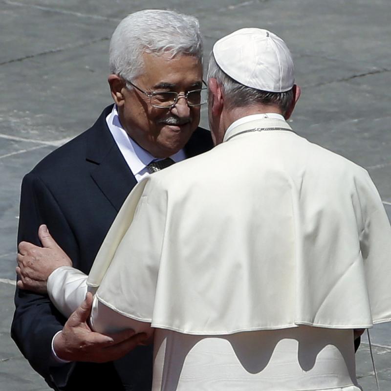 Pope Francis greets Palestinian President Mahmoud Abbas following a canonization ceremony for four nuns, including two Palestinians, in St. Peter's Square at the Vatican, on Sunday. Pope Francis greets Palestinian President Mahmoud Abbas following a canonization ceremony for four nuns, including two Palestinians, in St. Peter's Square at the Vatican, on Sunday.