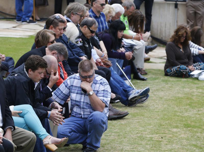 Spectators bow their heads during a moment of silence during a ceremony to commemorate the 20th anniversary of the Oklahoma City bombing at the Oklahoma City National Memorial, on Sunday. Spectators bow their heads during a moment of silence during a ceremony to commemorate the 20th anniversary of the Oklahoma City bombing at the Oklahoma City National Memorial, on Sunday.