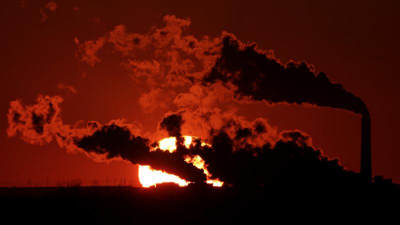 Steam from a coal-fired power plant is silhouetted against the sun near St. Marys, Kan. Industry groups say there should be a far more aggressive consideration of costs of regulation than the Obama administration took into account. Steam from a coal-fired power plant is silhouetted against the sun near St. Marys, Kan. Industry groups say there should be a far more aggressive consideration of costs of regulation than the Obama administration took into account.