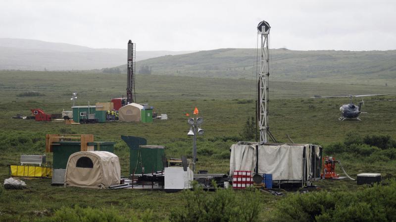 Workers with the Pebble Mine project test-drill in July 2007 in the Bristol Bay region of Alaska near the village of Iliamma. Workers with the Pebble Mine project test-drill in July 2007 in the Bristol Bay region of Alaska near the village of Iliamma.