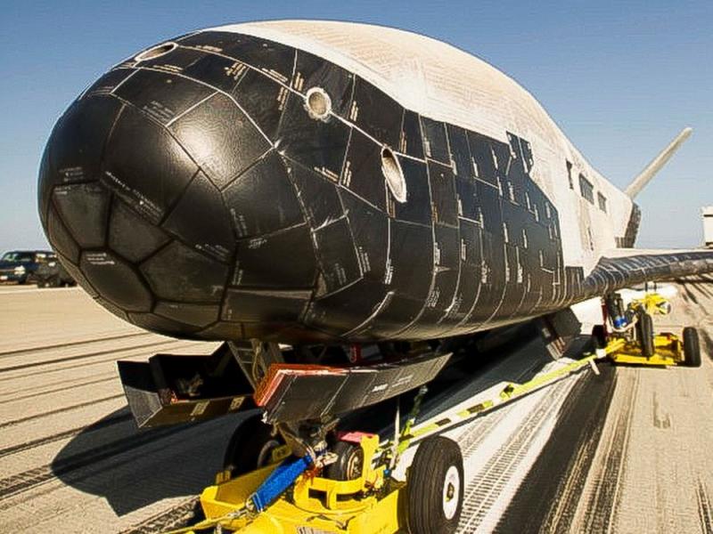 This photo released by Vandenberg Air Force Base on Monday shows the X-37B Orbital Test Vehicle, the Air Force's unmanned, reusable space plane, after it landed at Vandenberg from a previous orbital mission. This photo released by Vandenberg Air Force Base on Monday shows the X-37B Orbital Test Vehicle, the Air Force's unmanned, reusable space plane, after it landed at Vandenberg from a previous orbital mission.