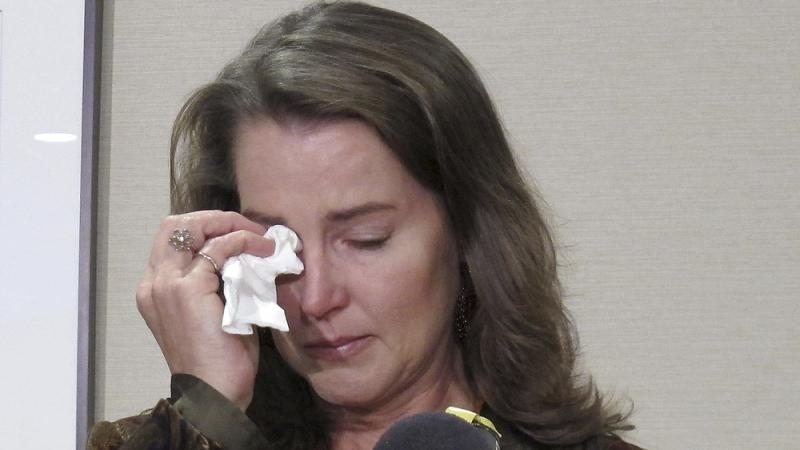 Cylvia Hayes, fiancee of Oregon Gov. John Kitzhaber, cries as she speaks at a news conference in Portland, Ore., on Thursday. Hayes admitted she violated the law when in 1997 she married an immigrant seeking to retain residency in the United States. Cylvia Hayes, fiancee of Oregon Gov. John Kitzhaber, cries as she speaks at a news conference in Portland, Ore., on Thursday. Hayes admitted she violated the law when in 1997 she married an immigrant seeking to retain residency in the United States.