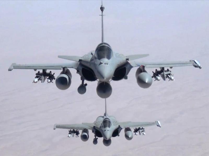 A remote camera screen grab provided by the French army shows two Rafale jet fighters flying over Iraq on Friday. French President Francois Hollande announced that the fighters had carried out their first airstrikes in northern Iraq. A remote camera screen grab provided by the French army shows two Rafale jet fighters flying over Iraq on Friday. French President Francois Hollande announced that the fighters had carried out their first airstrikes in northern Iraq.