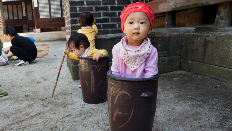 Jung Ha-yoon, 2, and other children in Seoul, South Korea, enjoy playing around (and in) ceramic jars. The country's infant mortality rate dropped 91 percent between 1972 and 2012. Jung Ha-yoon, 2, and other children in Seoul, South Korea, enjoy playing around (and in) ceramic jars. The country's infant mortality rate dropped 91 percent between 1972 and 2012.