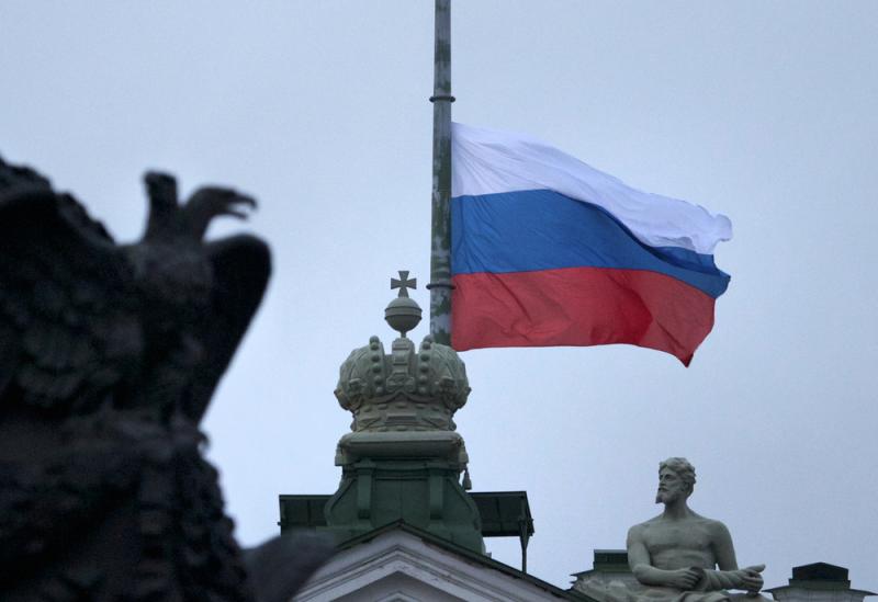 A Russian national flag flies at half staff at Dvortsovaya Square in St.Petersburg, Russia, on Monday. A Russian national flag flies at half staff at Dvortsovaya Square in St.Petersburg, Russia, on Monday.