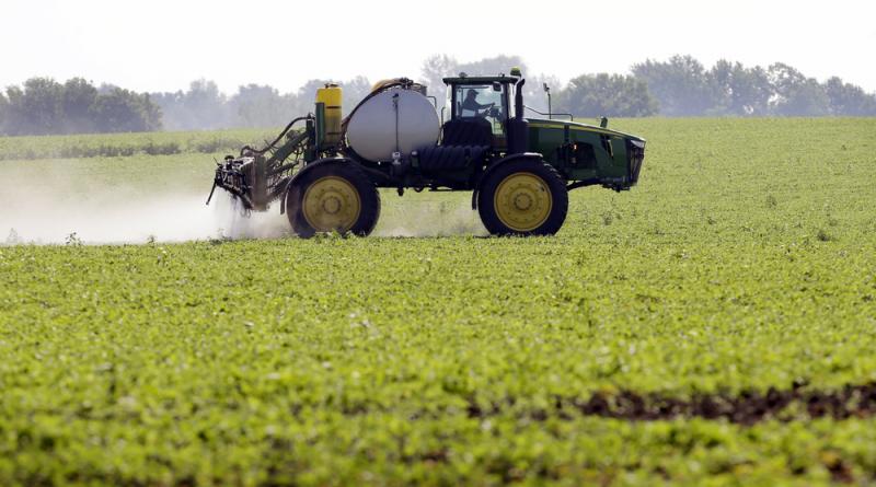 Soybeans are sprayed in Iowa in 2013. Enlist Duo is a mixture of two chemicals that farmers have used separately for many years: glyphosate (also known as Roundup) and 2,4-D. The new formulation is intended to work hand-in-hand with a new generation of co Soybeans are sprayed in Iowa in 2013. Enlist Duo is a mixture of two chemicals that farmers have used separately for many years: glyphosate (also known as Roundup) and 2,4-D. The new formulation is intended to work hand-in-hand with a new generation of co