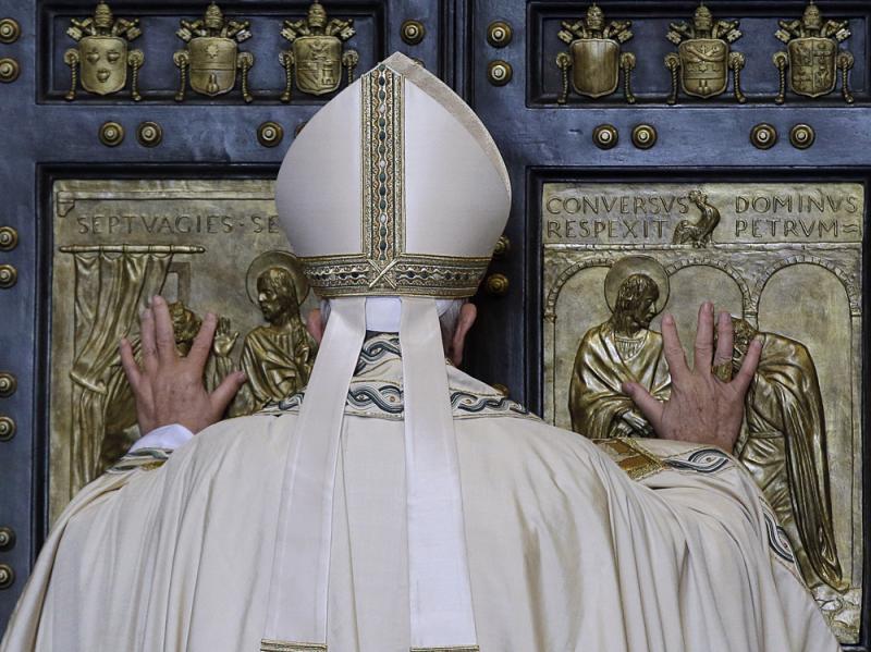 Pope Francis pushes open the Holy Door of St. Peter's Basilica, formally launching the Holy Year of Mercy, at the Vatican on Dec. 8. Pope Francis pushes open the Holy Door of St. Peter's Basilica, formally launching the Holy Year of Mercy, at the Vatican on Dec. 8.