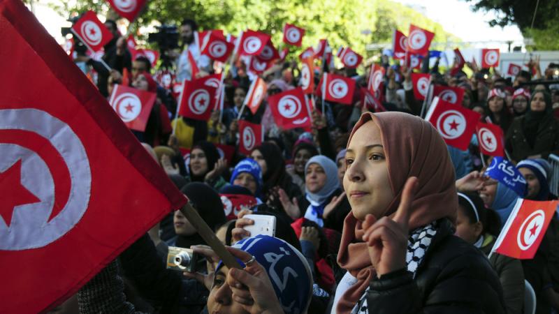 Tunisians celebrate the fifth anniversary of the Arab Spring on Thursday in Tunis. Tunisians celebrate the fifth anniversary of the Arab Spring on Thursday in Tunis.
