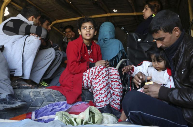 Civilians are loaded in a truck to be taken to safe places Thursday as Iraqi security forces clear the Soufiya neighborhood of Islamic State fighters in central Ramadi, 70 miles west of Baghdad, Iraq. Civilians are loaded in a truck to be taken to safe places Thursday as Iraqi security forces clear the Soufiya neighborhood of Islamic State fighters in central Ramadi, 70 miles west of Baghdad, Iraq.