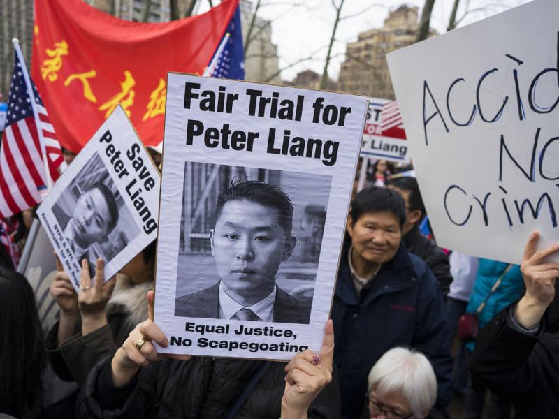 In this Feb. 20 photo, protesters attend a rally in Brooklyn, New York, in support of former NYPD police officer Peter Liang, who was convicted of manslaughter for the 2014 shooting death of Akai Gurley. In this Feb. 20 photo, protesters attend a rally in Brooklyn, New York, in support of former NYPD police officer Peter Liang, who was convicted of manslaughter for the 2014 shooting death of Akai Gurley.