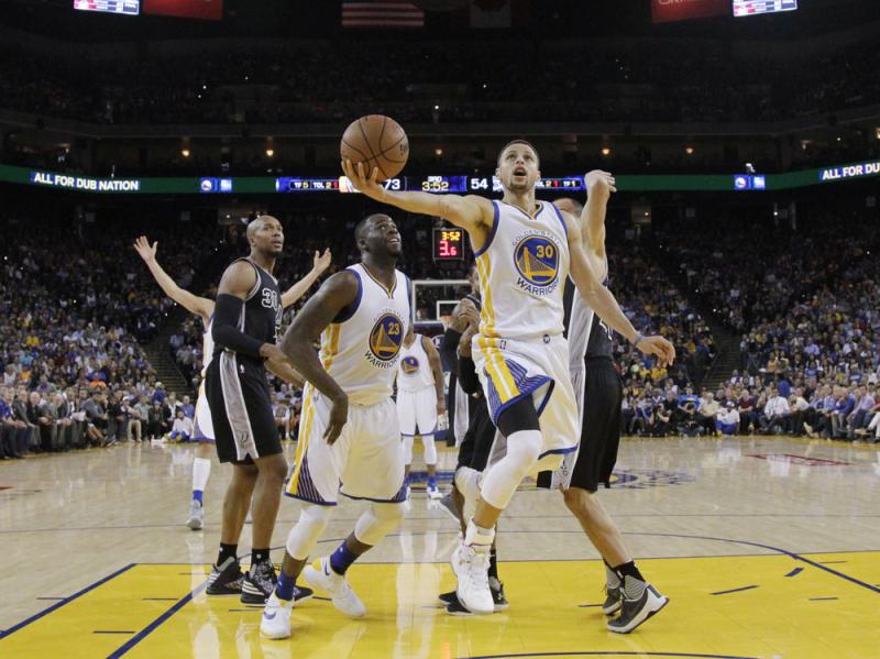 Golden State Warriors' Stephen Curry drives to the hoop during Thursday's game against the San Antonio Spurs. The Warriors won 112-101. Golden State Warriors' Stephen Curry drives to the hoop during Thursday's game against the San Antonio Spurs. The Warriors won 112-101.