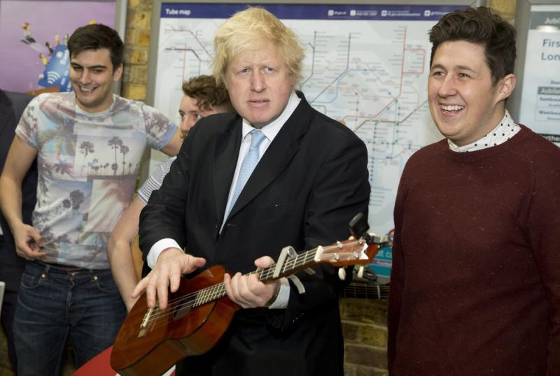 London Mayor Boris Johnson plays a guitar at an event to promote street performances in the city in March 2015. Johnson has broken ranks with Prime Minister David Cameron, a fellow Conservative Party member, by calling for Britain to leave the European Un London Mayor Boris Johnson plays a guitar at an event to promote street performances in the city in March 2015. Johnson has broken ranks with Prime Minister David Cameron, a fellow Conservative Party member, by calling for Britain to leave the European Un