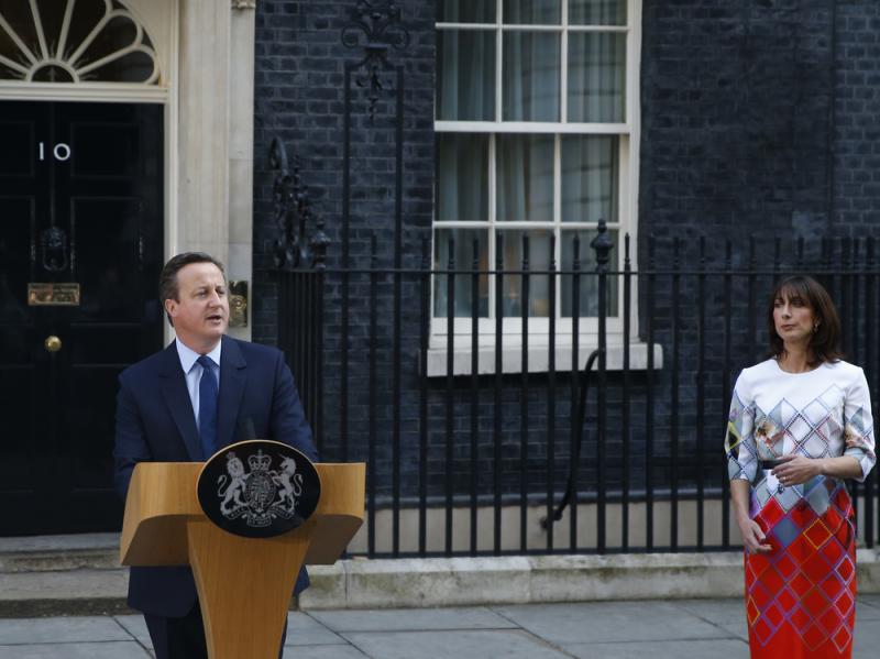 Britain's Prime Minister David Cameron, accompanied by his wife, Samantha, speaks to the media in front of 10 Downing St. on Friday as he announces his resignation following Britain's vote to leave the EU. Britain's Prime Minister David Cameron, accompanied by his wife, Samantha, speaks to the media in front of 10 Downing St. on Friday as he announces his resignation following Britain's vote to leave the EU.