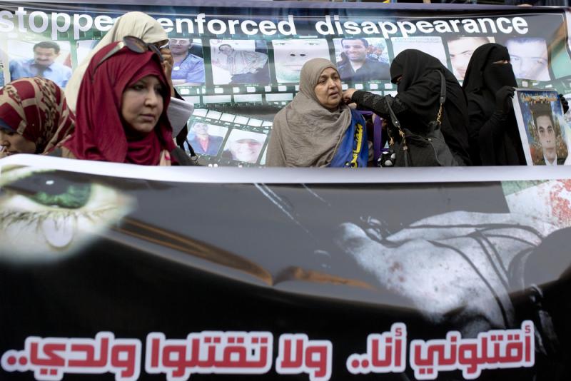 Relatives of detained prisoners, who claim their loved ones have been forcibly disappeared, protest and demand the release of their relatives in May in front of the Journalist's Syndicate building, in Cairo. Relatives of detained prisoners, who claim their loved ones have been forcibly disappeared, protest and demand the release of their relatives in May in front of the Journalist's Syndicate building, in Cairo.