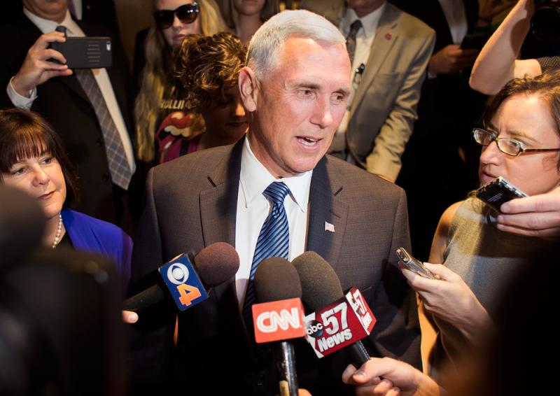 Indiana Gov. Mike Pence took questions from the media as he and his wife, Karen, left their New York hotel to meet with Republican presidential candidate Donald Trump on July 15. Pence has drawn criticism from the left and the right for various health car Indiana Gov. Mike Pence took questions from the media as he and his wife, Karen, left their New York hotel to meet with Republican presidential candidate Donald Trump on July 15. Pence has drawn criticism from the left and the right for various health car