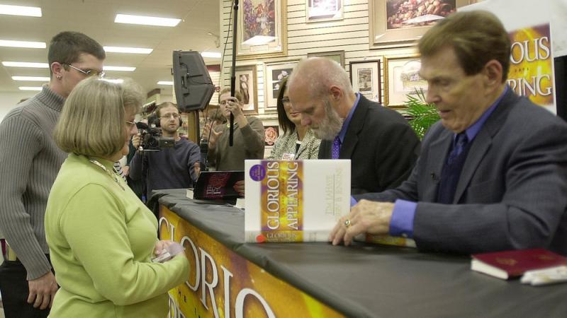 Tim LaHaye (right) and Jerry B. Jenkins sign the 12th book in the Left Behind series at a store in Spartanburg, S.C., in 2004. Tim LaHaye (right) and Jerry B. Jenkins sign the 12th book in the Left Behind series at a store in Spartanburg, S.C., in 2004.
