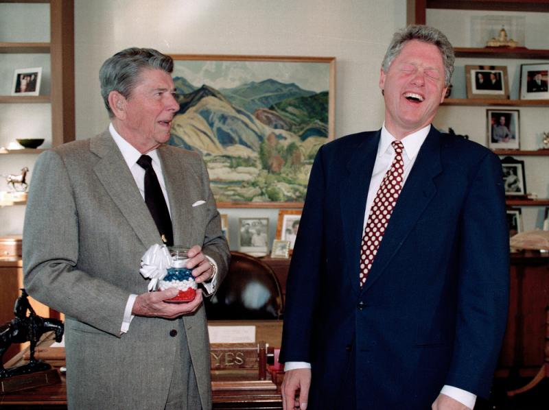 U.S. President Bill Clinton, right, reacts as former President Ronald Reagan presents him with a jar of red, white and blue jelly beans. U.S. President Bill Clinton, right, reacts as former President Ronald Reagan presents him with a jar of red, white and blue jelly beans.