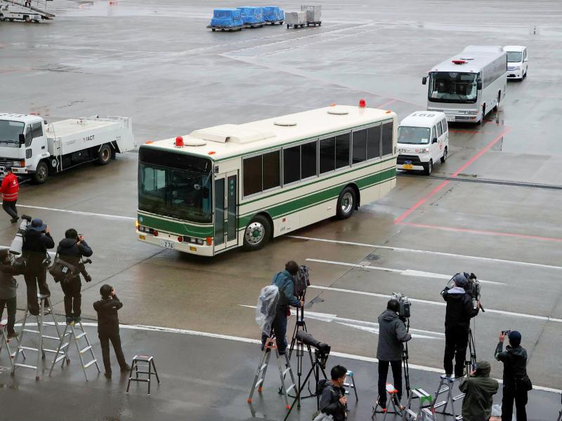 A bus believed to be carrying former U.S. special forces member Michael Taylor and his son Peter, who allegedly staged the operation to help fly former Nissan chief Carlos Ghosn out of Japan in 2019, leaves Narita International Airport in Japan on Tuesday A bus believed to be carrying former U.S. special forces member Michael Taylor and his son Peter, who allegedly staged the operation to help fly former Nissan chief Carlos Ghosn out of Japan in 2019, leaves Narita International Airport in Japan on Tuesday