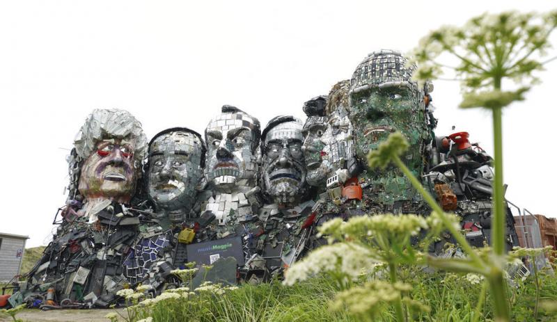 A sculpture created out of electronic waste in the likeness of Mount Rushmore and the G-7 leaders sits on a hill in Cornwall, England, near where the leaders of the world's wealthiest nations will meet. A sculpture created out of electronic waste in the likeness of Mount Rushmore and the G-7 leaders sits on a hill in Cornwall, England, near where the leaders of the world's wealthiest nations will meet.