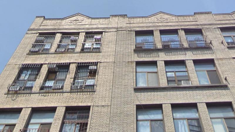 The exterior of the condo building at 165 Henry St. in Manhattan's Lower East Side hints at the split-level apartments inside, as air conditioners (upper left) are positioned at both the upper and lower windows of the top two floors. The exterior of the condo building at 165 Henry St. in Manhattan's Lower East Side hints at the split-level apartments inside, as air conditioners (upper left) are positioned at both the upper and lower windows of the top two floors.