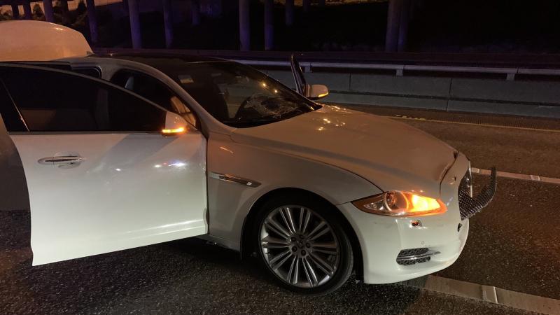 In this photograph shared by the Washington State Patrol, the vehicle that hit protesters sits dented and damaged. Police say they have arrested the driver, but they have not yet assigned a motive for the incident. In this photograph shared by the Washington State Patrol, the vehicle that hit protesters sits dented and damaged. Police say they have arrested the driver, but they have not yet assigned a motive for the incident.