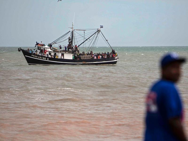Navy members help evacuate people on a boat from the Karata and Wawa Bar communities ahead of the arrival of Hurricane Iota in Bilwi, Puerto Cabezas, Nicaragua, on Sunday. Navy members help evacuate people on a boat from the Karata and Wawa Bar communities ahead of the arrival of Hurricane Iota in Bilwi, Puerto Cabezas, Nicaragua, on Sunday.