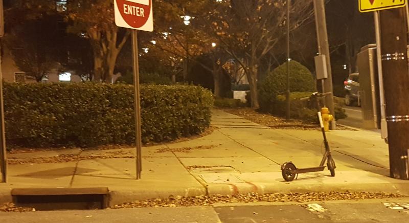 A Bird Scooter on the corner Bird Scooter