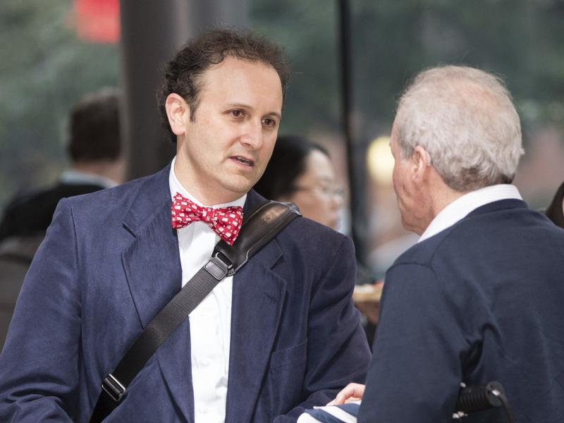 Dr. Aaron Kesselheim (left), a professor at Harvard Medical School, at a documentary film screening in 2018 in Boston. He has resigned from a Food and Drug Administration advisory panel over the FDA's decision to approve an Alzheimer's drug. Dr. Aaron Kesselheim (left), a professor at Harvard Medical School, at a documentary film screening in 2018 in Boston. He has resigned from a Food and Drug Administration advisory panel over the FDA's decision to approve an Alzheimer's drug.