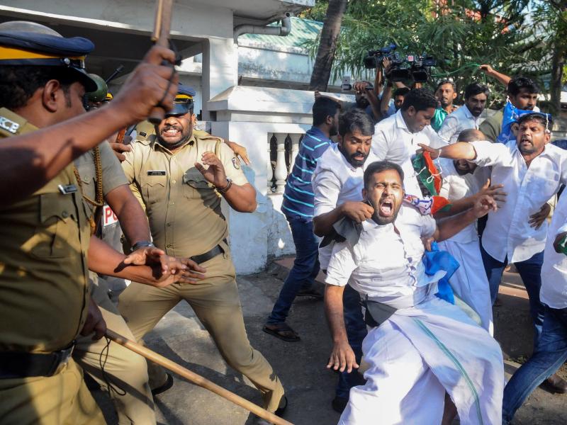 Indian police take protesters into custody during widespread demonstrations over two women entering the Sabarimala temple in the southern India state of Kerala earlier this week. Indian police take protesters into custody during widespread demonstrations over two women entering the Sabarimala temple in the southern India state of Kerala earlier this week.