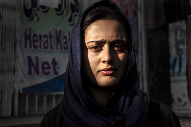 Dawlatt Naimati, 22, from Kunduz, stands outside an internet café where she is seeking help applying for a U.S. special immigrant visa on Aug. 8, in Kabul, Afghanistan. Dawlatt Naimati, 22, from Kunduz, stands outside an internet café where she is seeking help applying for a U.S. special immigrant visa on Aug. 8, in Kabul, Afghanistan.