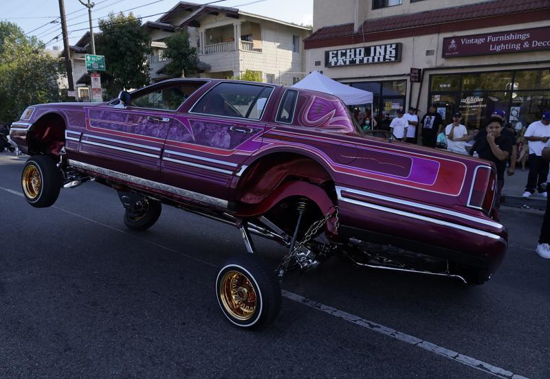 A Lowrider rides on three-wheels on Sunset Blvd., in the Echo Park neighborhood of Los Angeles in July. A Lowrider rides on three-wheels on Sunset Blvd., in the Echo Park neighborhood of Los Angeles in July.