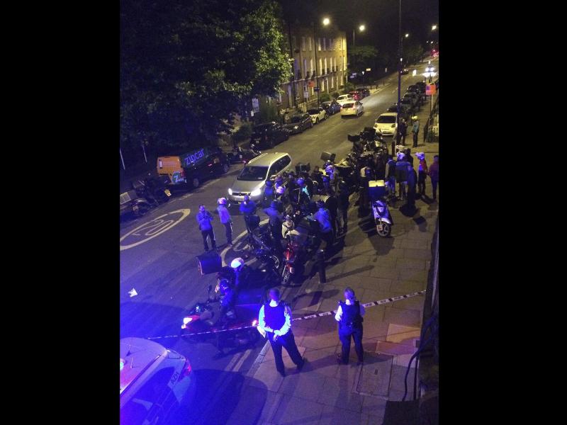 Authorities respond to the scene of an acid attack in London on Thursday night. Authorities respond to the scene of an acid attack in London on Thursday night.