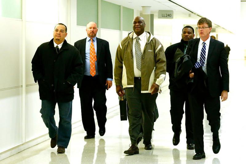 Three Rikers corrections officers — Alfred Rivera (left), Tobias Parker (center) and Jeffrey Richard (second from right) — arrive at court in March. Rivera and Parker were among the five officers convicted, while Richard was found not guilty. Three Rikers corrections officers — Alfred Rivera (left), Tobias Parker (center) and Jeffrey Richard (second from right) — arrive at court in March. Rivera and Parker were among the five officers convicted, while Richard was found not guilty.